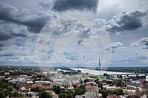 Aerial Panorama of Riga with the daugava river during a sunny afternoon, with the radio and tv tower in background. Riga is the