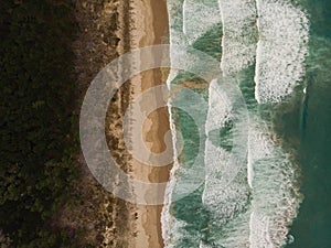 Aerial panorama of sand coast pacific ocean sea shore Opoutere beach waves Waikato Coromandel Peninsula New Zealand