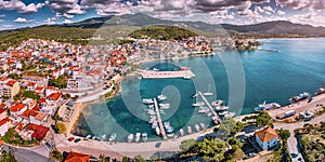 Panorama of a scenic resort town Neos Marmaras with yacht marina sea port in Halkidiki, Sithonia. Travel attractions and photo