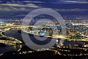 Aerial panorama of Taipei City in a blue gloomy night