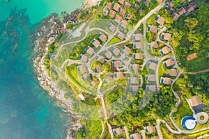 Aerial panorama of tropical resort territory and beach, beautiful Andaman sea at west coast of Phuket Island. Kata Noi beach from