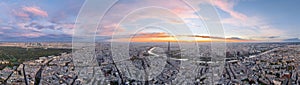 Aerial panorama twilight romantic sky of famous Eiffel Tower in Paris, France