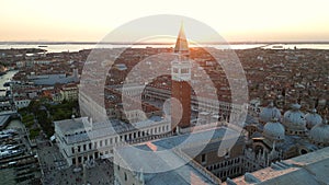 Aerial panorama of Venice city skyline at sunset, St. Mark's Square, Italy