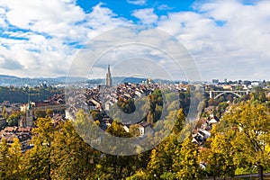 Aerial panorama view of Bern old town with Bern Minster MÃ¼nster cathedral and Aare river, Switzerland
