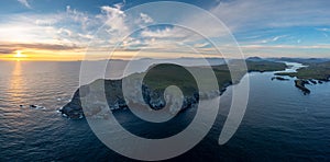 Aerial panorama view of the Bray Head cliffs and headland on Valentia Island at sunset