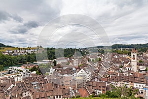 Aerial panorama view of old town cityscape of Schaffhausen and the Rhine river from the Munot fortification in summer on a cloudy