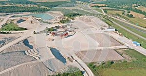 Aerial panorama view of open quarries mining mine extracting with work of machinery equipment