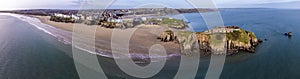 An aerial panorama view of Saint Catherines Island, the South Beach and the town of Tenby, Wales