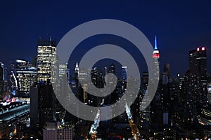 Aerial and panorama view of skyscrapers of New York City, Manhattan. view of night midtown of Manhattan with stars and moon