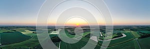 Aerial panorama view of  sunrise over the Ridgway near Swindon