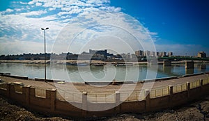 Aerial panorama view to Baghdad city and Tigris promenade from Al-Mustansiriya University and Madrasah, Baghdad, Iraq