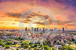 Aerial panorama of Warsaw, Poland  over the Vistual river and City center in a distance. Sunset sky