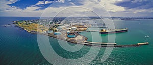 Aerial panorama of Williamstown suburb and industrial wharfs. photo