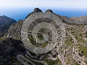 Aerial panorama of winding curvy mountain road street Sa Corbata Sa Calobra Mallorca Balearic Islands Spain Europe photo