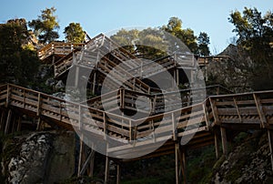 Aerial panorama of wooden walkway zigzag stairs staircase nature hiking trail path Passadicos do Paiva Arouca Portugal photo