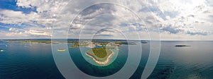 Aerial panoramic drone picture of Vrsar harbour in Croatia with turquoise water during daytime