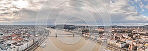 Aerial panoramic drone shot of Szchenyi Bridge over Danube in Budapest winter morning photo