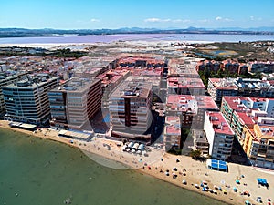 Aerial panoramic drone view of Torrevieja resort townscape beach and Las Salinas photo