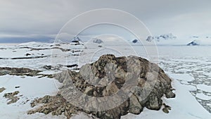 Aerial panoramic flight over Antarctica shoreline.