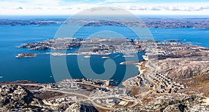 Aerial panoramic full view of Nuuk city and fjord from the top o