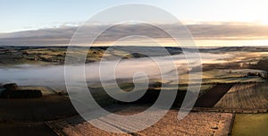 Aerial panoramic landscape of a cloud inversion at Haydon Bridge in the River Tyne Valley