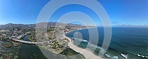 Aerial panoramic shot of the beach with the waves crashing on the shore, Los angeles, Malibu