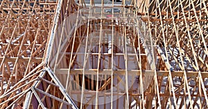 Aerial panoramic top view on wooden roof beams trusses system framed construction