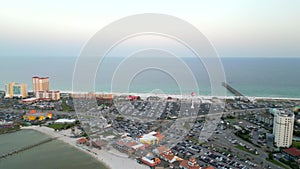 Aerial panoramic video Pensacola Beach FL summer sunset view of Gulf of Mexico