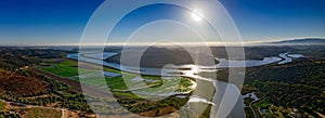 Aerial panoramic view of Algarve countryside landscape, above Arade river in Silves, a Popular Nature Destination Region, in South