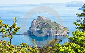 Aerial panoramic view of Aragonese Castle, most popular landmark and travel destination located in Tyrrhenian sea near Ischia