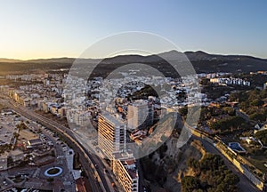 Aerial panoramic view of Arenys de Mar city at dawn. Located in El Maresme, Barcelona, Spain photo