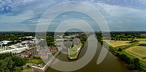 Aerial panoramic view of the bullnose entrance lock gates to Preston Marina off the River Ribble Lancashire England