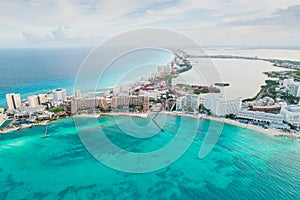 Aerial panoramic view of Cancun beach and city hotel zone in Mexico. Caribbean coast landscape of Mexican resort with