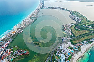 Aerial panoramic view of Cancun beach and city hotel zone in Mexico. Caribbean coast landscape of Mexican resort with