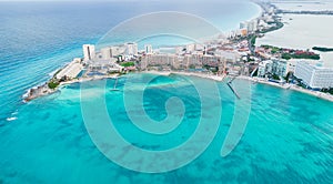 Aerial panoramic view of Cancun beach and city hotel zone in Mexico. Caribbean coast landscape of Mexican resort with