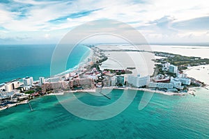 Aerial panoramic view of Cancun beach and city hotel zone in Mexico. Caribbean coast landscape of Mexican resort with