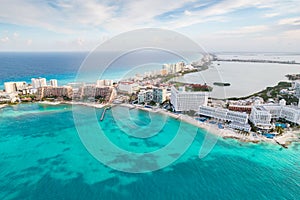 Aerial panoramic view of Cancun beach and city hotel zone in Mexico. Caribbean coast landscape of Mexican resort with