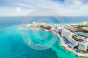 Aerial panoramic view of Cancun beach and city hotel zone in Mexico. Caribbean coast landscape of Mexican resort with