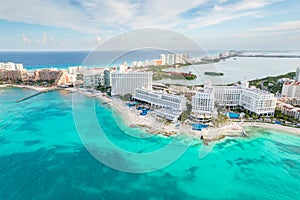 Aerial panoramic view of Cancun beach and city hotel zone in Mexico. Caribbean coast landscape of Mexican resort with