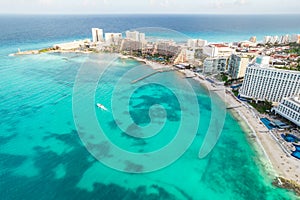 Aerial panoramic view of Cancun beach and city hotel zone in Mexico. Caribbean coast landscape of Mexican resort with