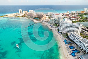 Aerial panoramic view of Cancun beach and city hotel zone in Mexico. Caribbean coast landscape of Mexican resort with