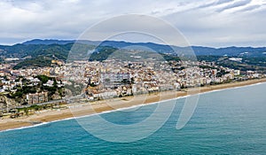 Aerial panoramic view of Canet de Mar city at dawn.  Barcelona, Spain photo