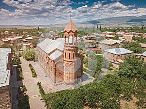 Aerial panoramic view of church of St. Mesrop Mashtots in Oshakan town. The saints grave is located inside cathedral