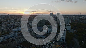 Aerial panoramic view of cityscape with modern high rise office buildings against sunset sky. Charlottenburg