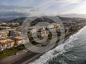 Aerial panoramic view on coastline in Torrox Costa, Costa del Sol, small touristic town between Malaga and Nerja, Andalusia, Spain