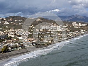 Aerial panoramic view on coastline in Torrox Costa, Costa del Sol, small touristic town between Malaga and Nerja, Andalusia, Spain