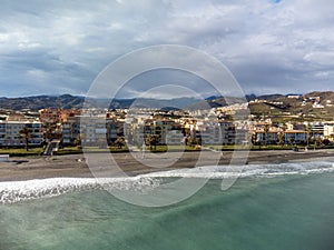 Aerial panoramic view on coastline in Torrox Costa, Costa del Sol, small touristic town between Malaga and Nerja, Andalusia, Spain