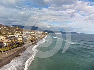 Aerial panoramic view on coastline in Torrox Costa, Costa del Sol, small touristic town between Malaga and Nerja, Andalusia, Spain