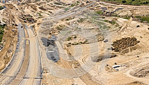 Aerial panoramic view of construction site with industrial machinery