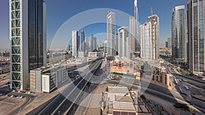 Aerial panoramic view of Dubai Downtown skyline with many towers timelapse.